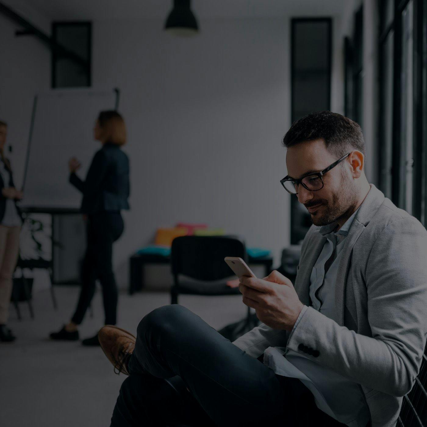 Man sitting with his mobile