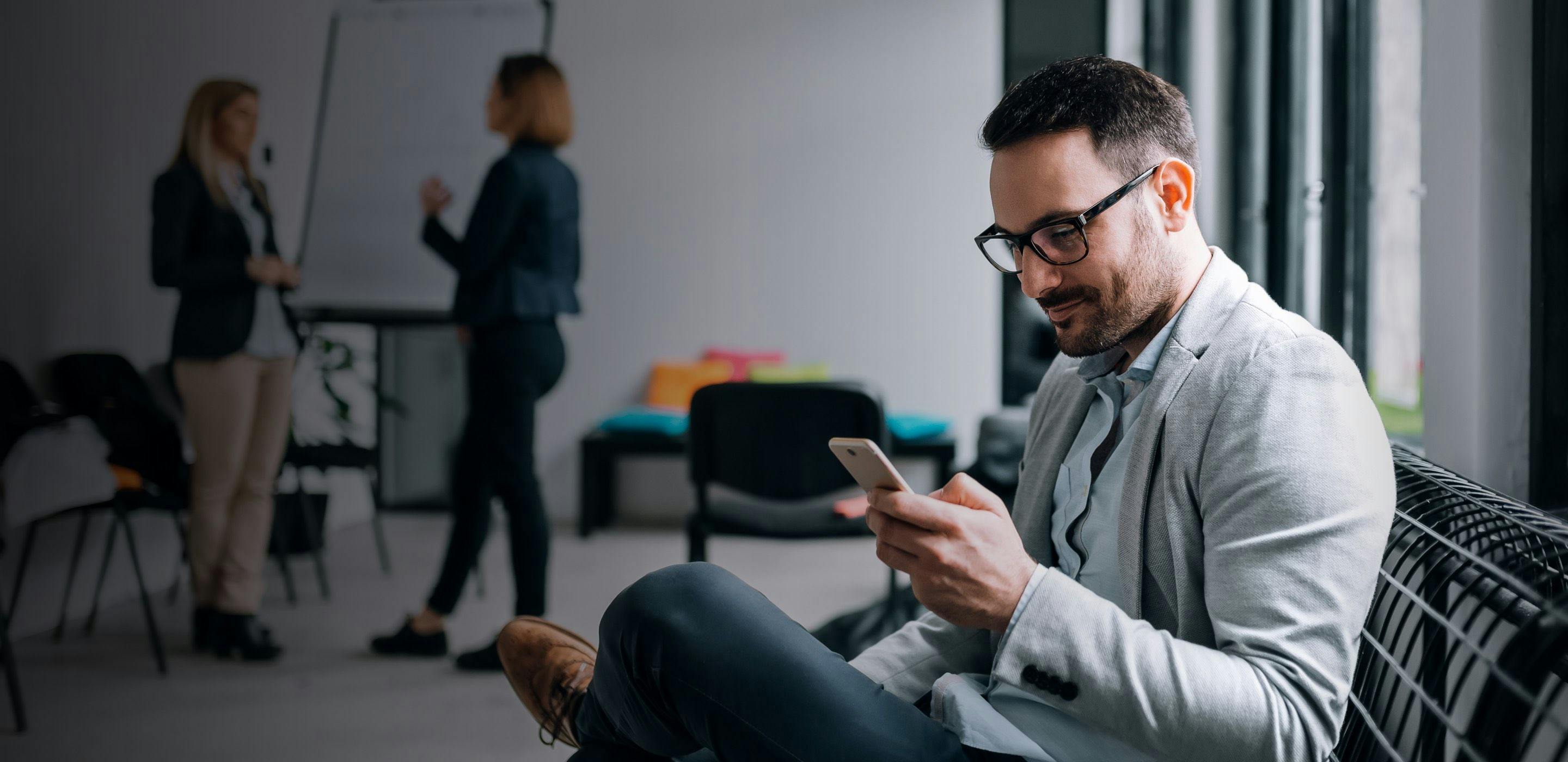 Man sitting with his mobile